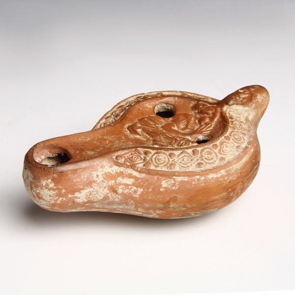 North African Roman Oil Lamp with a Young Woman