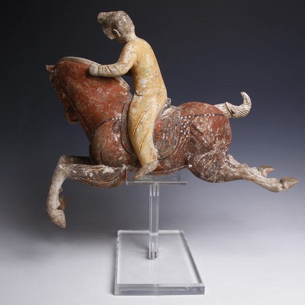 A Pair of Chinese Painted Terracotta Female Polo Players with Horses