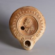 Roman Oil Lamp with Male Figure