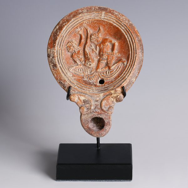 roman 1st century oil lamp with erotic scene