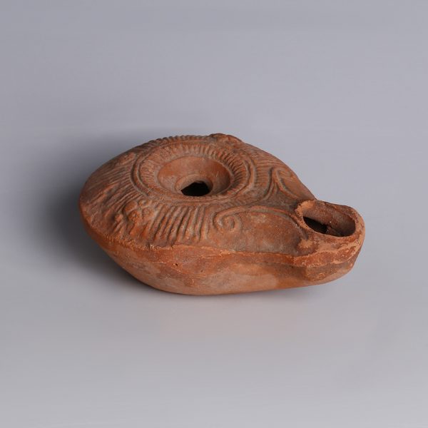 Roman Oil Lamp with Linear Design and Rosettes