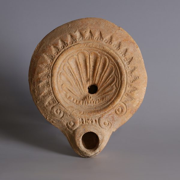 Roman Oil Lamp with Shell Motif