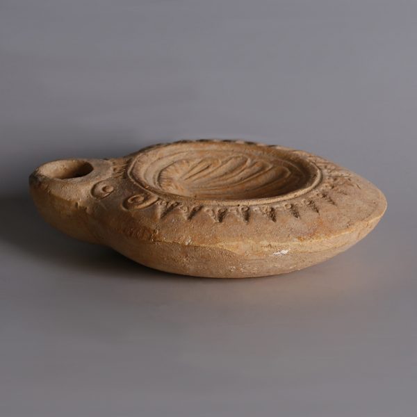 Roman Oil Lamp with Shell Motif