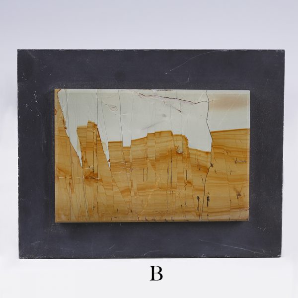 selectionof small landscape stone slabs on slate b