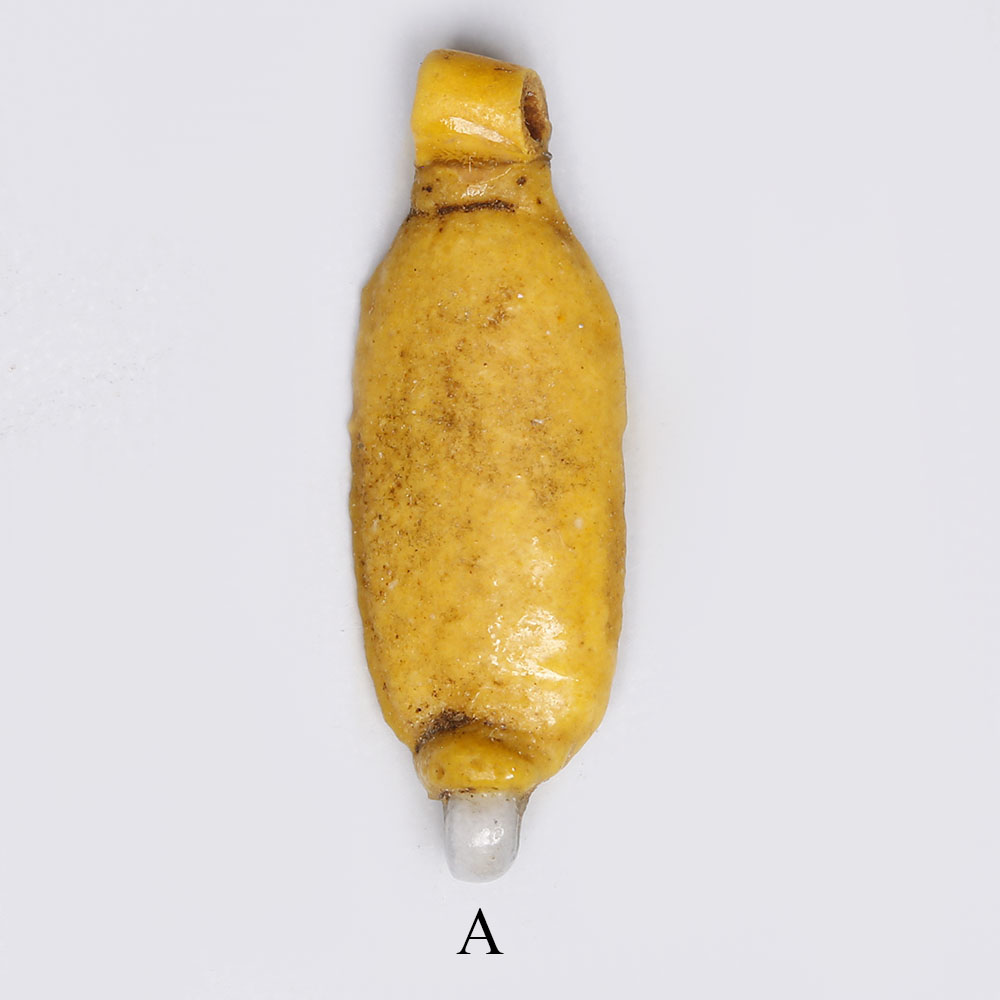 Selection of Egyptian Bright Yellow Glazed Faience Amulets Selection of Egyptian Bright Yellow Glazed Faience Amulets