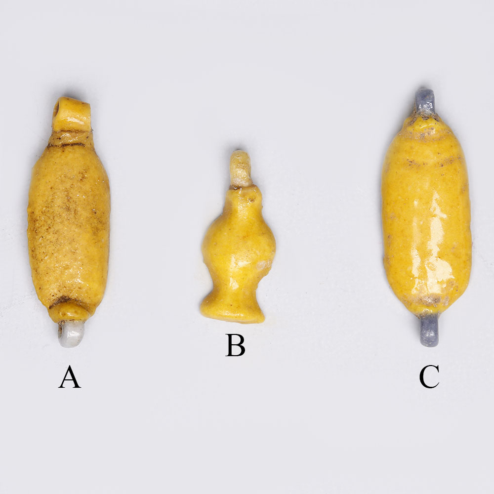 Selection of Egyptian Bright Yellow Glazed Faience Amulets Selection of Egyptian Bright Yellow Glazed Faience Amulets