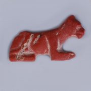 Ancient Egyptian Red Glass Inlay of a Lioness