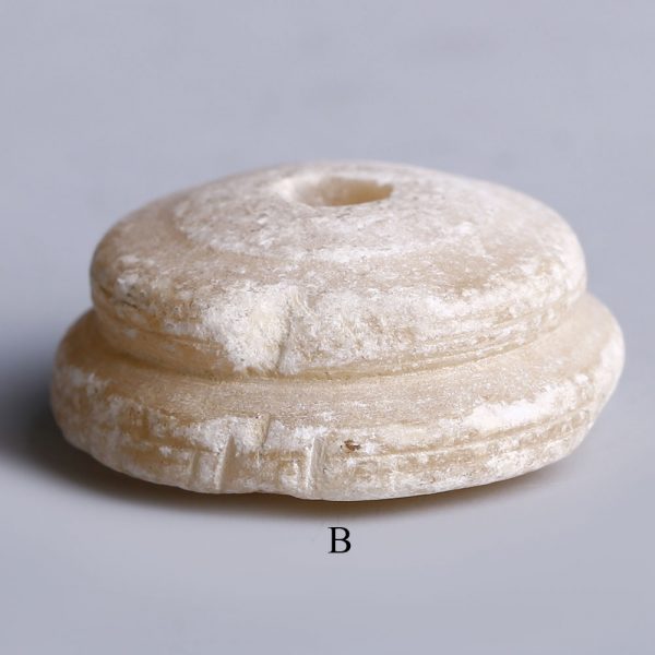 near eastern selection of alabaster spindle whorls b