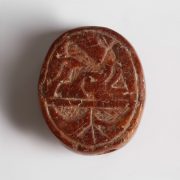 Southern Levantine Red Stone Scaraboid Seal with Griffin