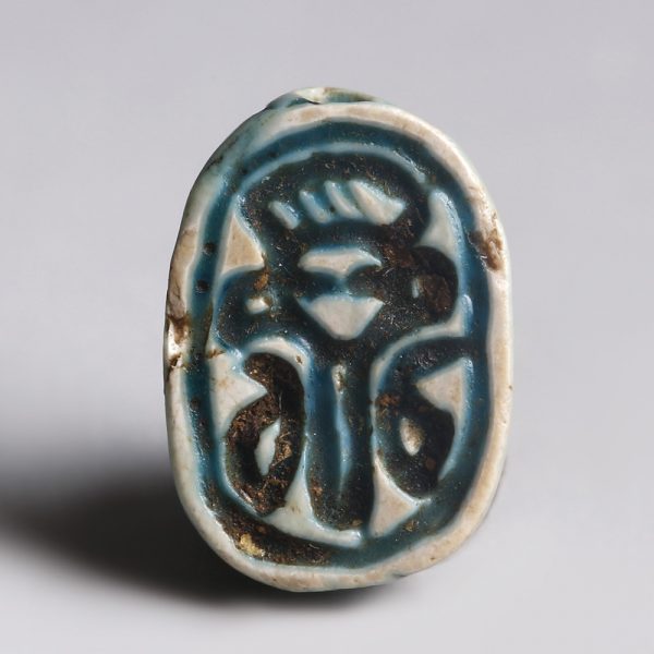 Egyptian Turquoise-Glazed Steatite Scarab with Hathor Emblem