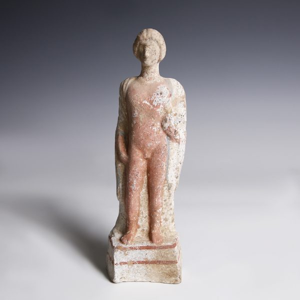 A Greek Terracotta Statuette of a Young Man