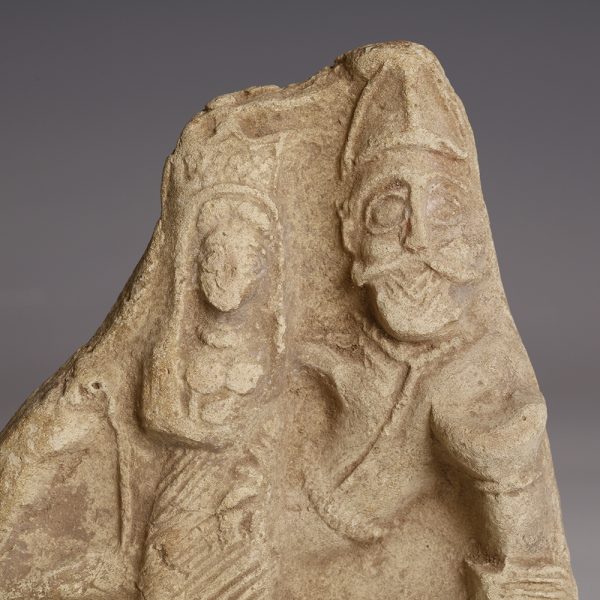 A Parthian Terracotta Plaque Depicting a Reclining Couple