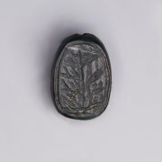 Egyptian Black Obsidian Scarab with Floral Designs