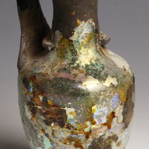 iridescent-roman-glass-jug-with-handle-close-up