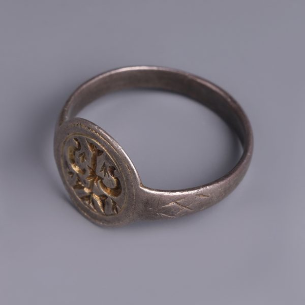 A Late Roman Silver Gilt Ring with Christian Imagery