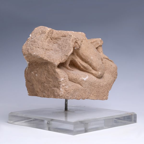 Tarentine Limestone Relief Fragment of a Crouching Man