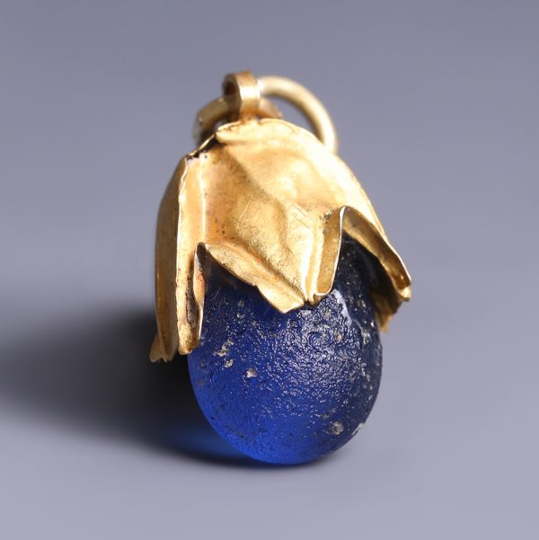Viking Elf Shot Gold Pendant with Blue Glass