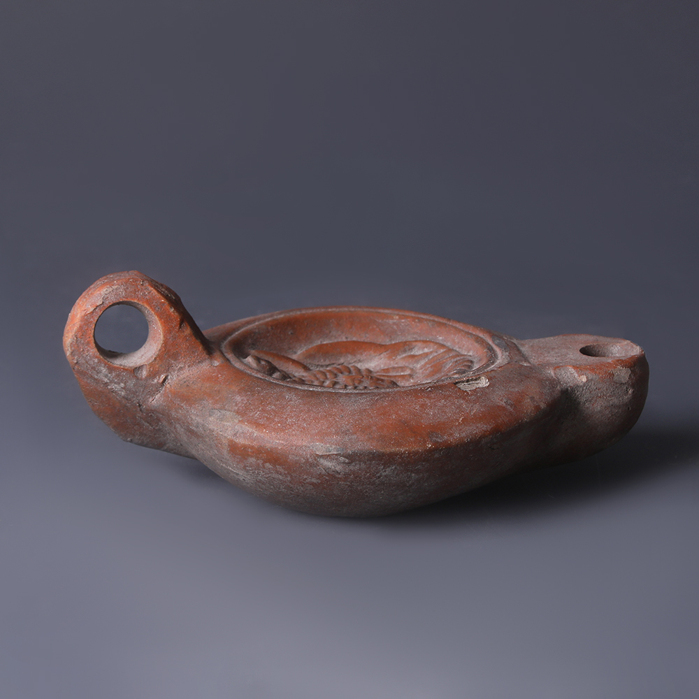 Ancient Roman Terracotta Oil Lamp with Africa Ancient Roman Terracotta Oil Lamp with Africa