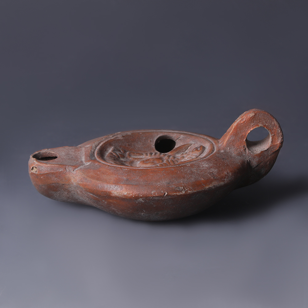 Ancient Roman Terracotta Oil Lamp with Africa Ancient Roman Terracotta Oil Lamp with Africa
