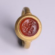 Roman Gold Ring with Carnelian Intaglio of a Gryllos Eagle and Man
