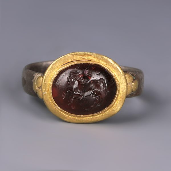 Ancient Roman Silver and Gold Ring with Garnet Intaglio of a Horse