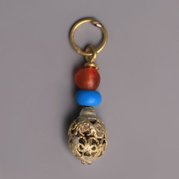 Western Asiatic Carnelian, Glass and Gold Pendant
