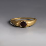Western Asiatic Gold Ring with Garnet Cabochon