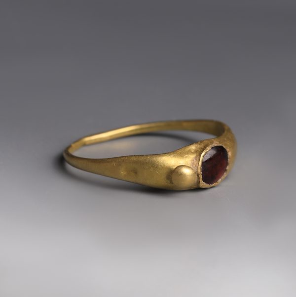 Western Asiatic Gold Ring with Garnet Cabochon