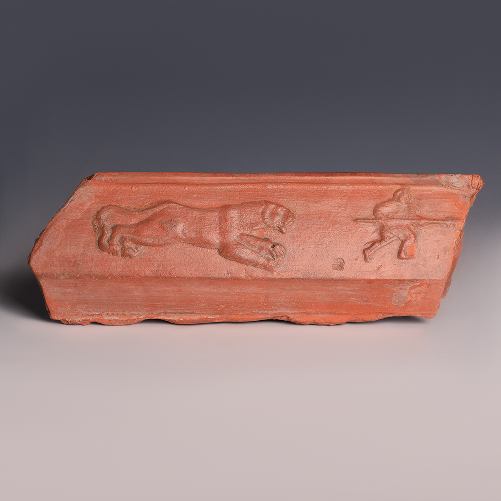 Roman North African Red Slipware Plaque with Lioness and Hunter Roman North African Red Slipware Plaque with Lioness and Hunter