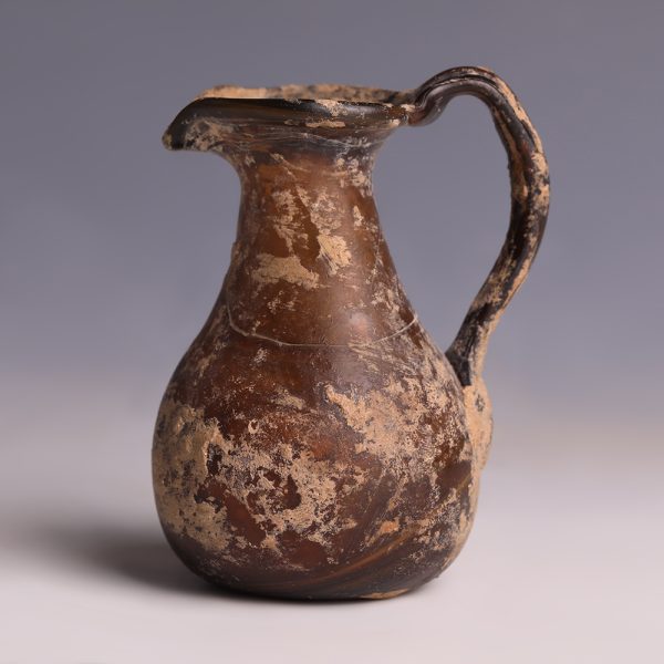 Roman Dark Amber Glass Jug with Pinched Spout