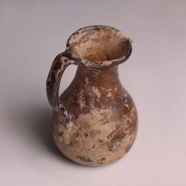 Roman Dark Amber Glass Jug with Pinched Spout