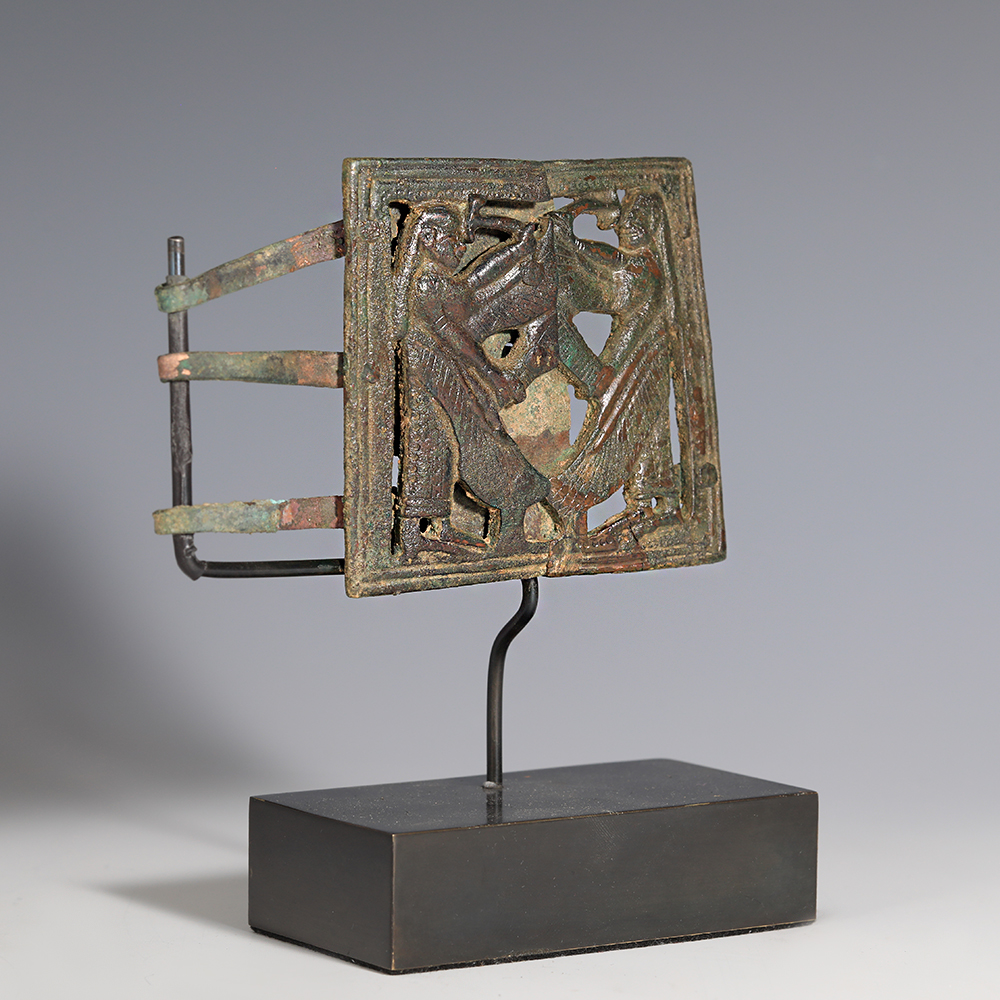 Neo-Assyrian Bronze Belt Buckle with Winged Genii Neo-Assyrian Bronze Belt Buckle with Winged Genii