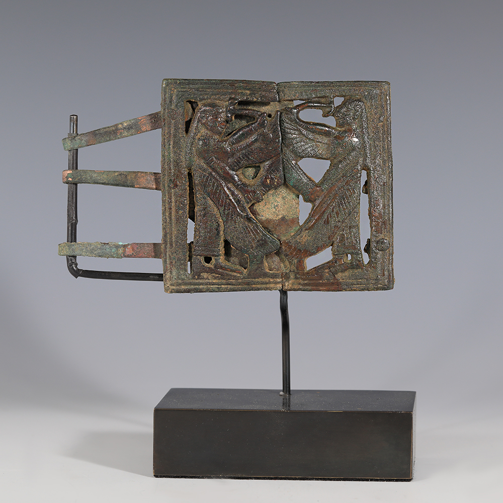 Neo-Assyrian Bronze Belt Buckle with Winged Genii Neo-Assyrian Bronze Belt Buckle with Winged Genii