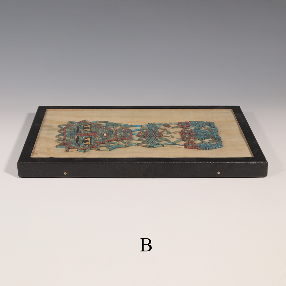 Selection of Ancient Egyptian Framed Beaded Mummy Masks with Funerary Face, Four Sons of Horus and Winged Scarab Selection of Ancient Egyptian Framed Beaded Mummy Masks with Funerary Face, Four Sons of Horus and Winged Scarab