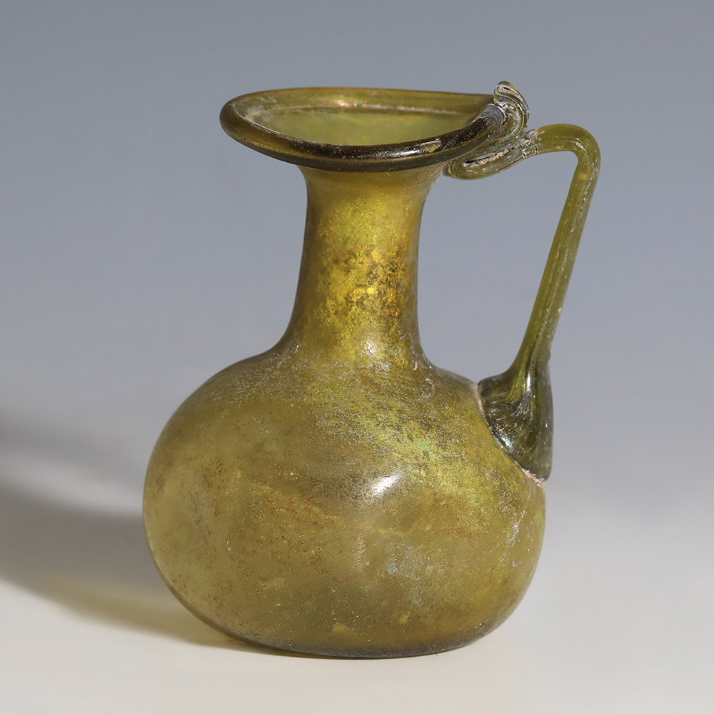 Roman Glass Dimpled Jug Roman Glass Dimpled Jug
