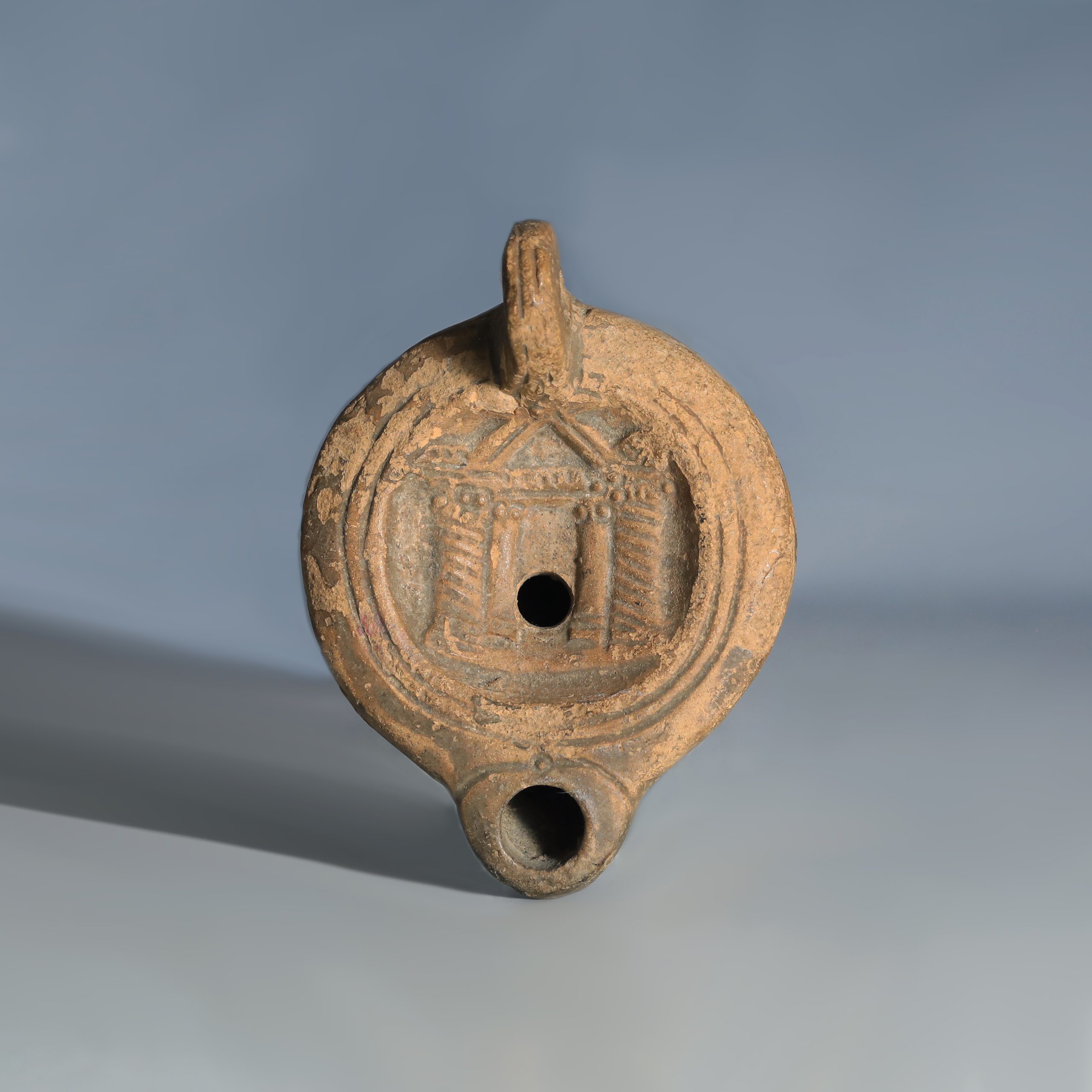Roman Terracotta Oil Lamp with Temple Architecture Roman Terracotta Oil Lamp with Temple Architecture