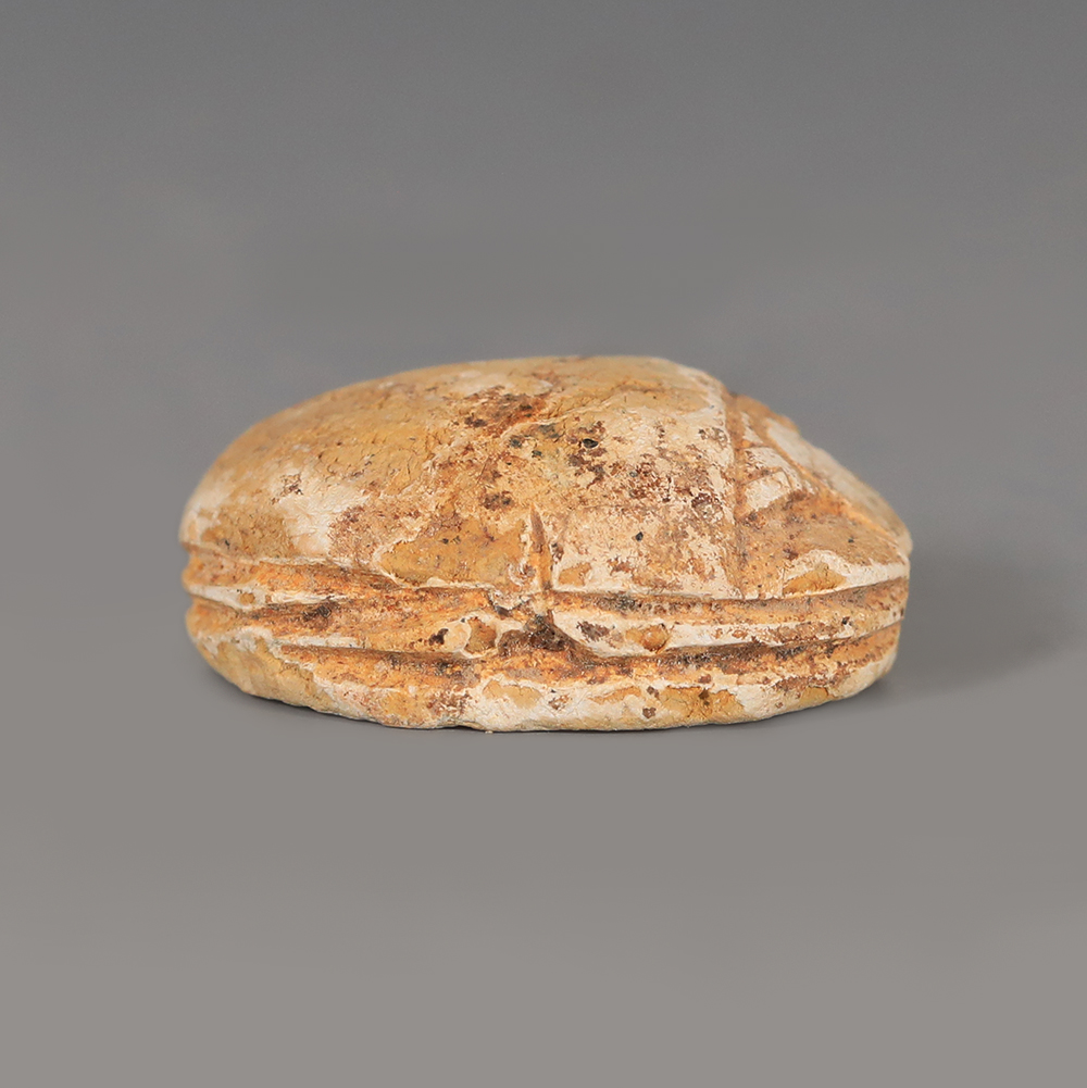 Egyptian Steatite Scarab Amulet with Winged Falcon Deity Egyptian Steatite Scarab Amulet with Winged Falcon Deity