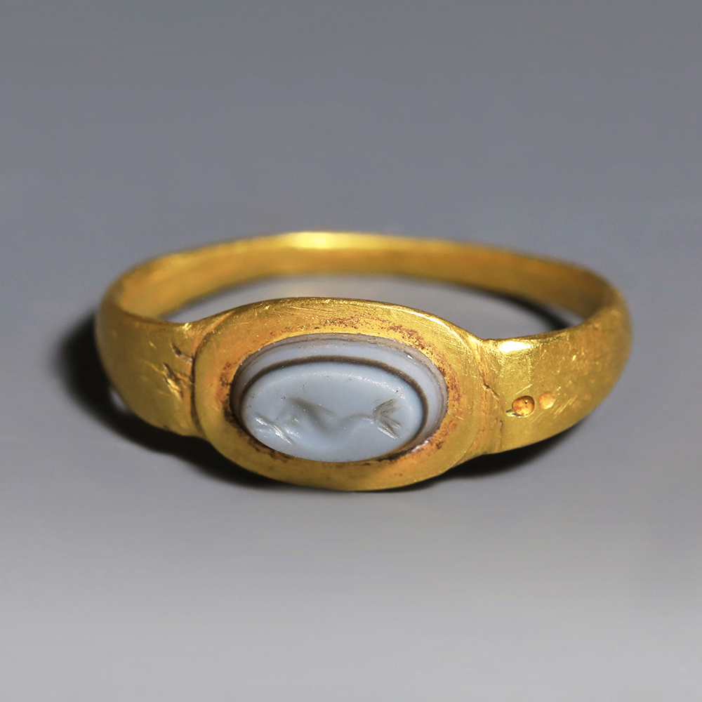 Ancient Roman Gold Ring with Agate Intaglio of a Dolphin Ancient Roman Gold Ring with Agate Intaglio of a Dolphin