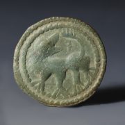 Anglo-Saxon Bronze Applied Brooch Face with a Facing Beast