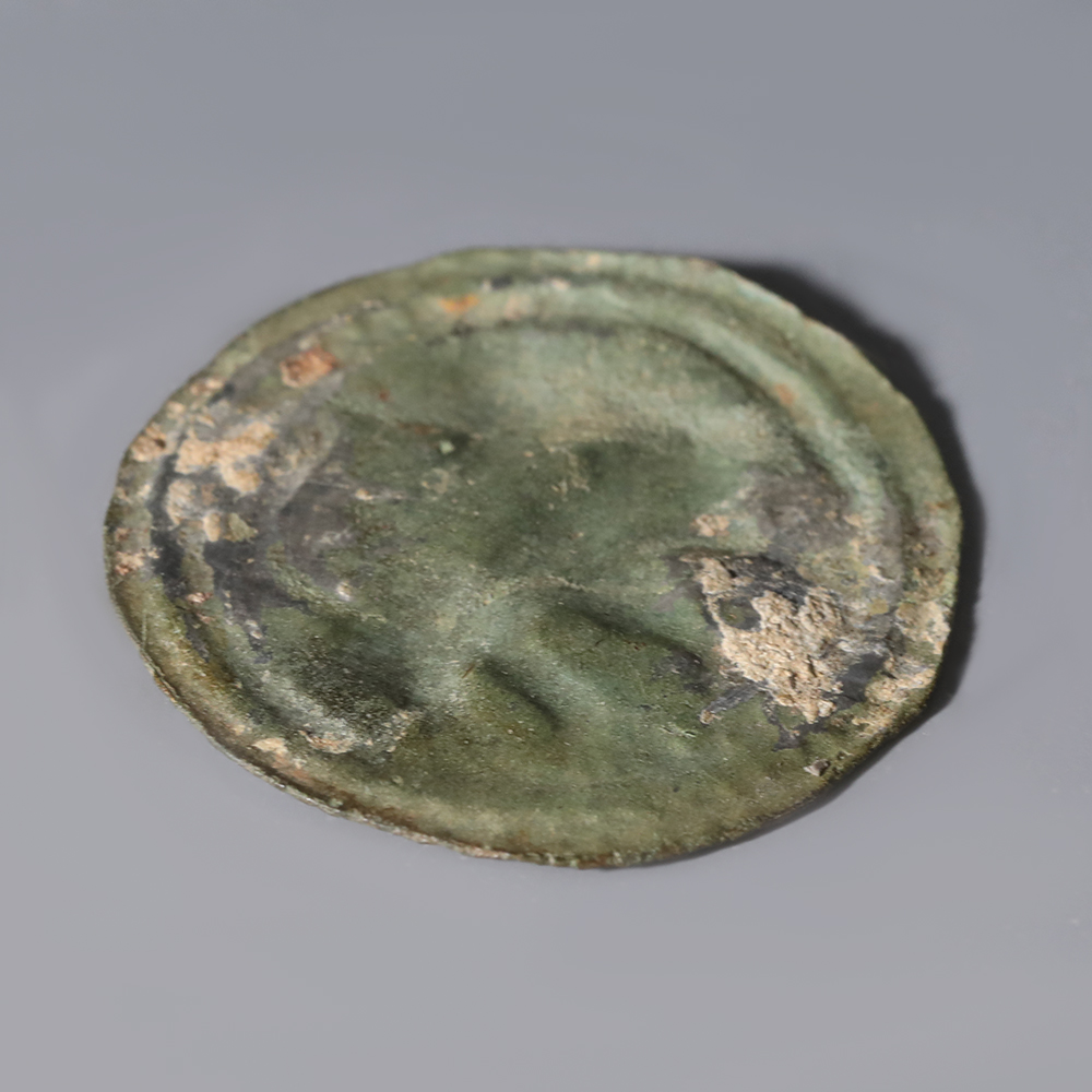 Anglo-Saxon Bronze Applied Brooch Face with a Facing Beast Anglo-Saxon Bronze Applied Brooch Face with a Facing Beast