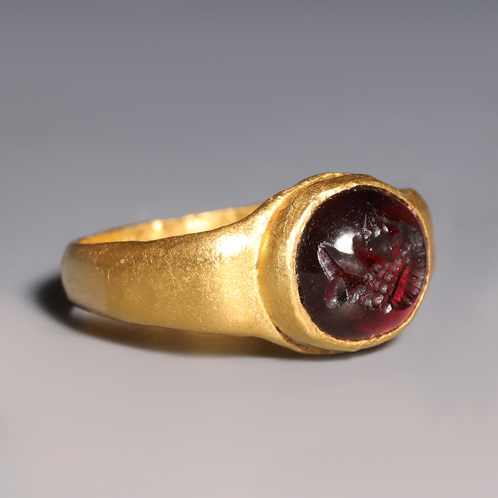 Roman Gold and Garnet Ring with Male Bust Roman Gold and Garnet Ring with Male Bust