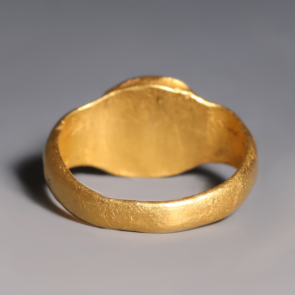 Roman Gold and Garnet Ring with Male Bust Roman Gold and Garnet Ring with Male Bust