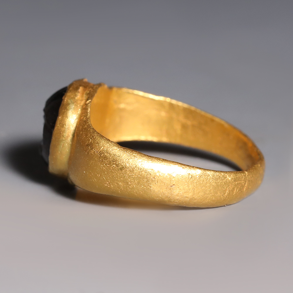 Roman Gold and Garnet Ring with Male Bust Roman Gold and Garnet Ring with Male Bust