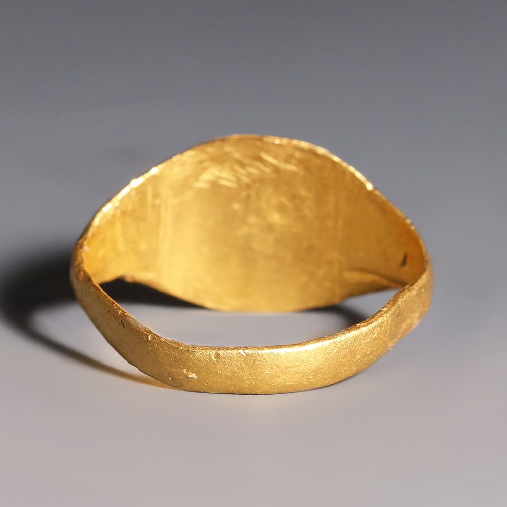 Roman Gold and Garnet Ring with Male Profile Roman Gold and Garnet Ring with Male Profile