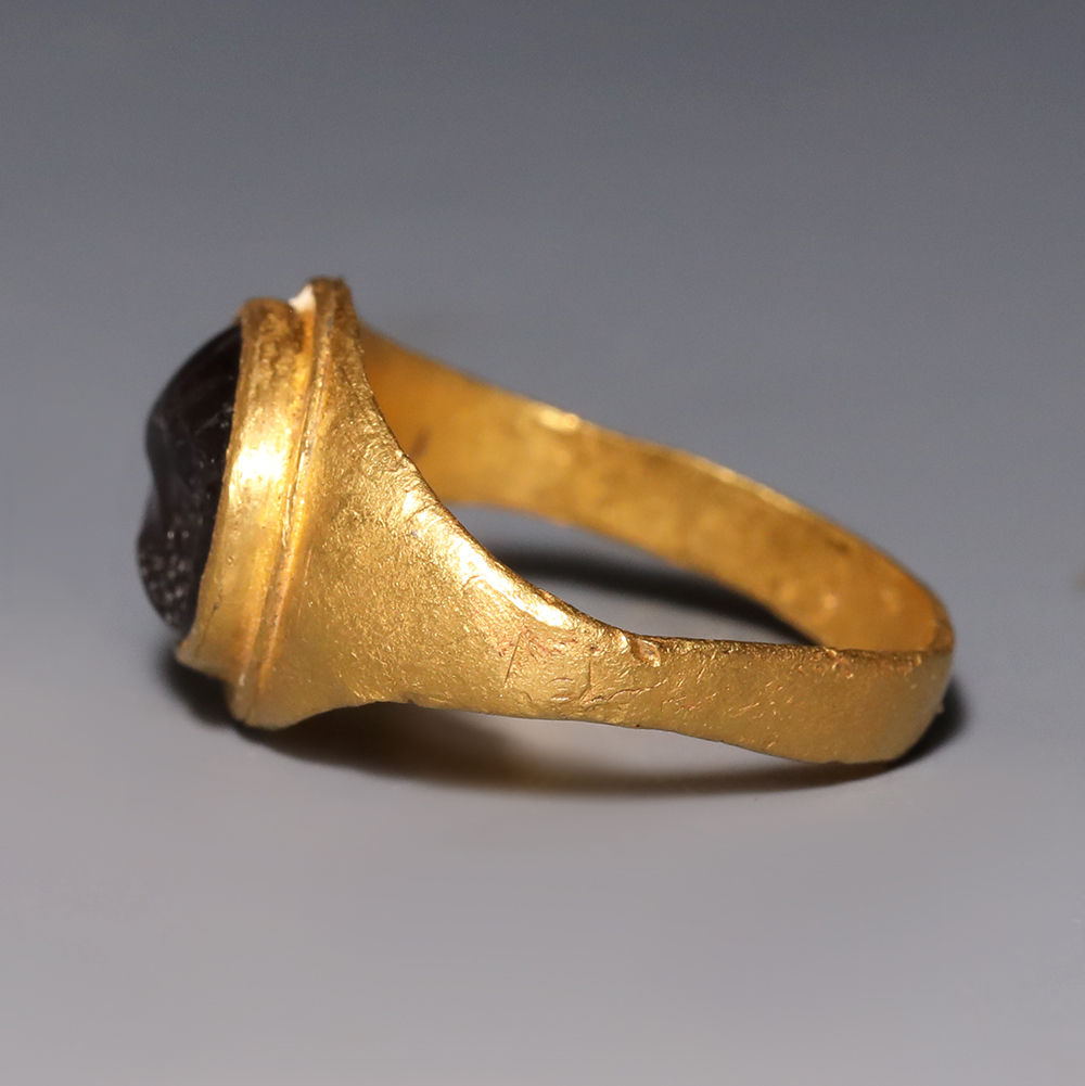 Roman Gold and Garnet Ring with Male Profile Roman Gold and Garnet Ring with Male Profile