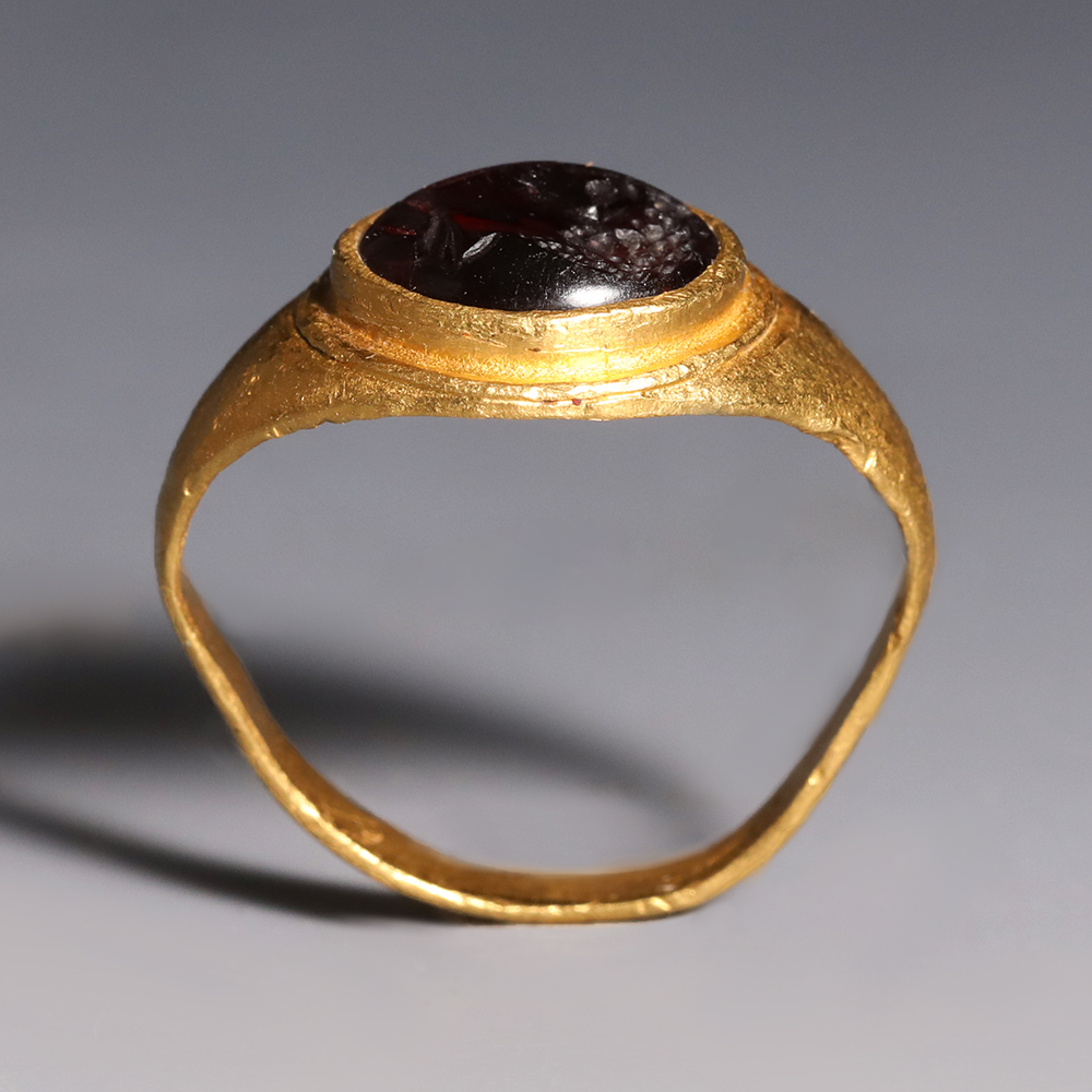 Roman Gold and Garnet Ring with Male Profile Roman Gold and Garnet Ring with Male Profile