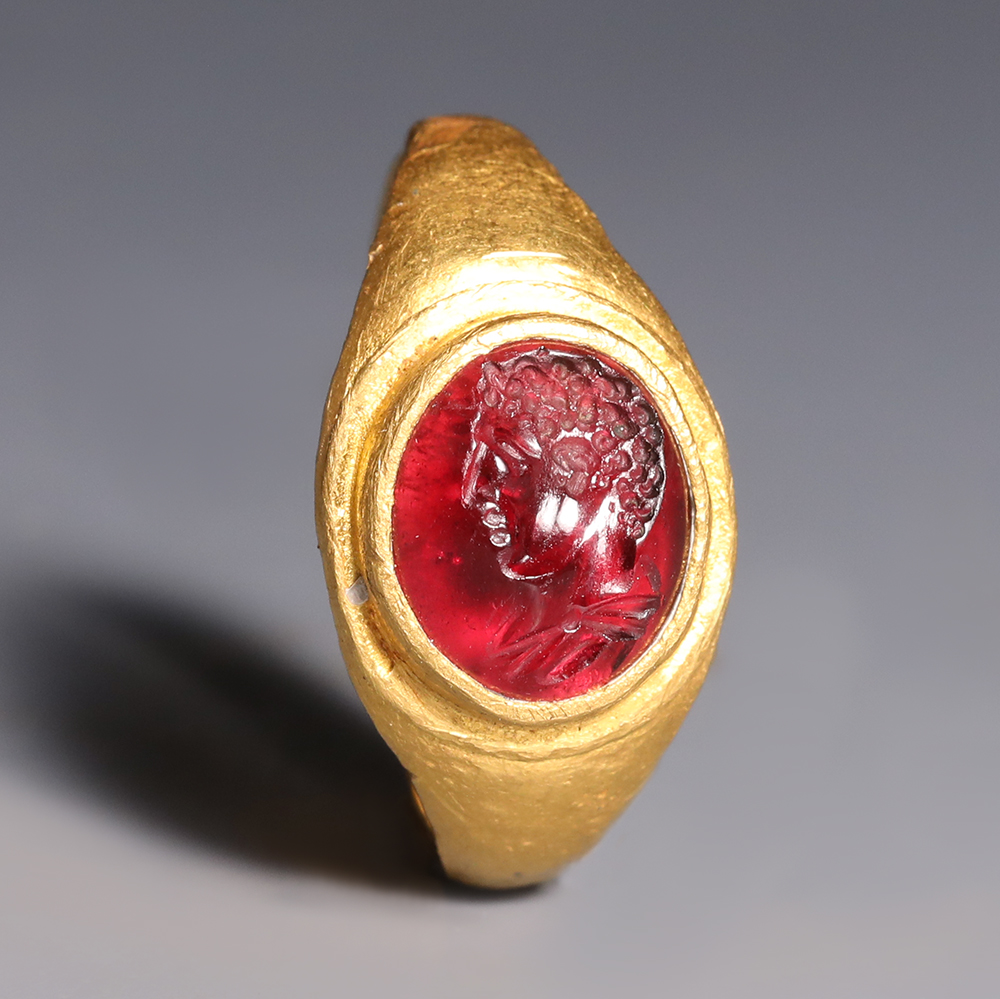 Roman Gold and Garnet Ring with Male Profile Roman Gold and Garnet Ring with Male Profile