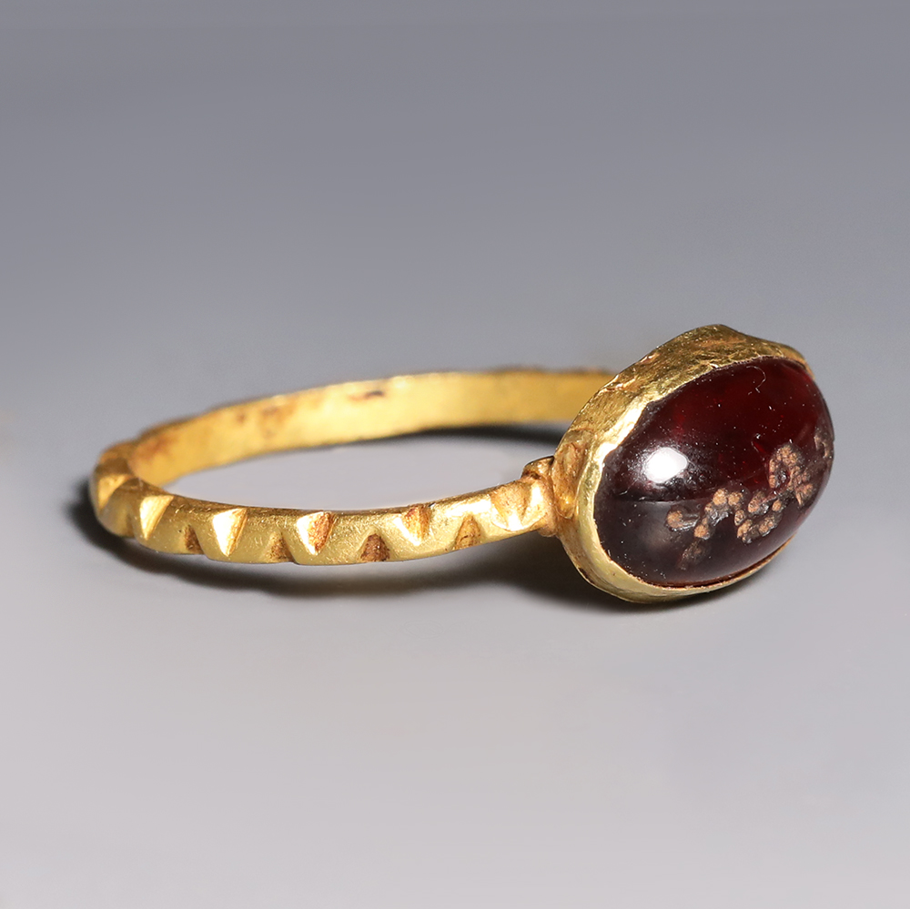Roman Gold and Garnet Ring with Snake Roman Gold and Garnet Ring with Snake