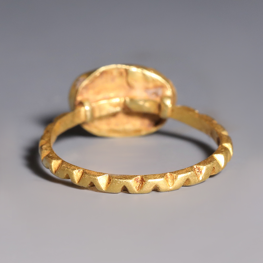 Roman Gold and Garnet Ring with Snake Roman Gold and Garnet Ring with Snake