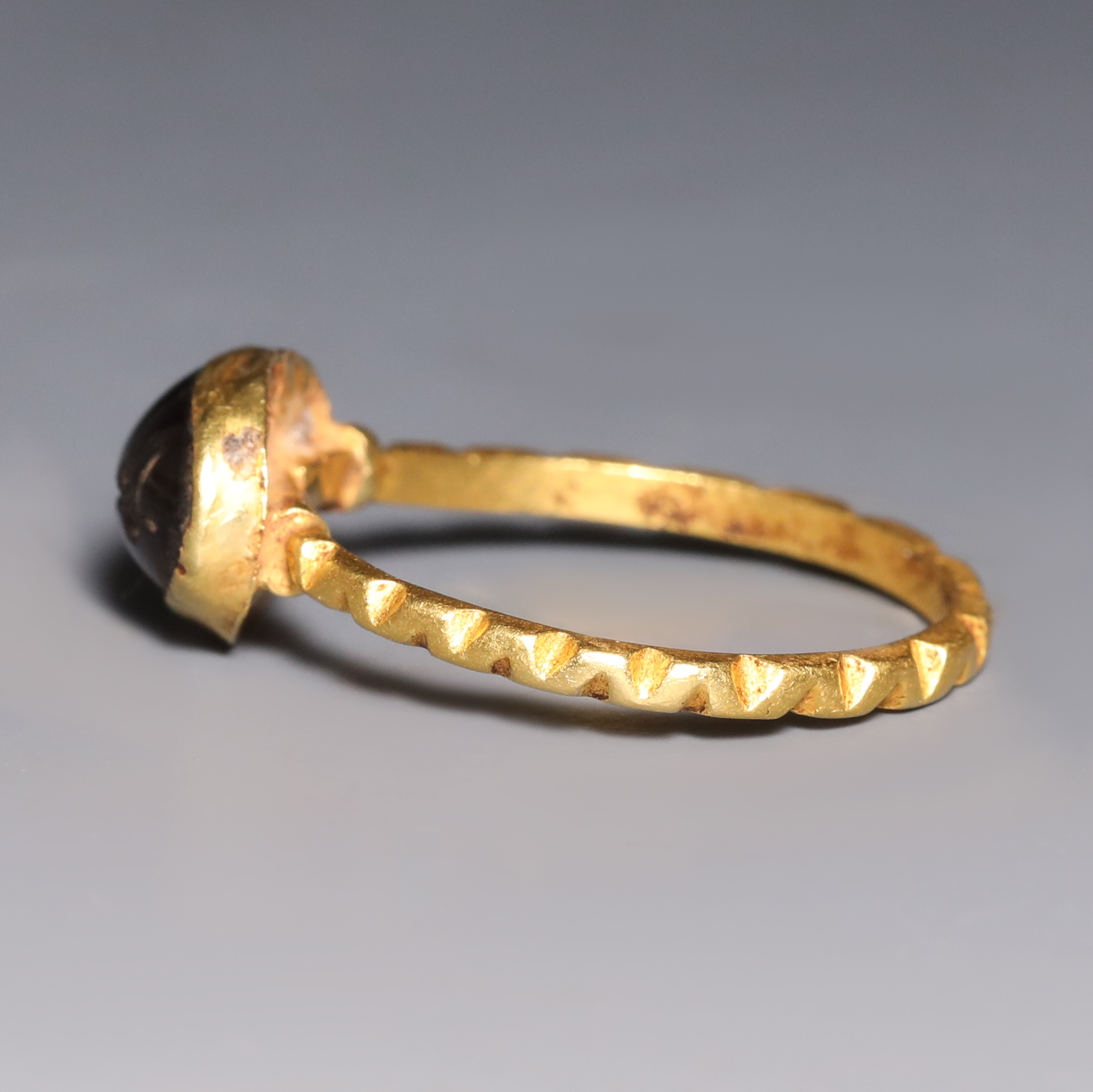 Roman Gold and Garnet Ring with Snake Roman Gold and Garnet Ring with Snake